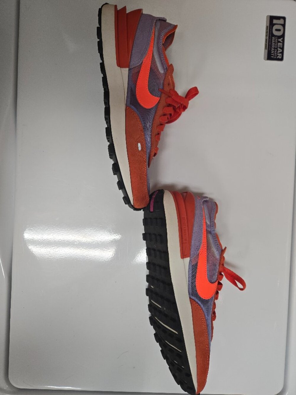 Nike women's 7.5 purple and orange